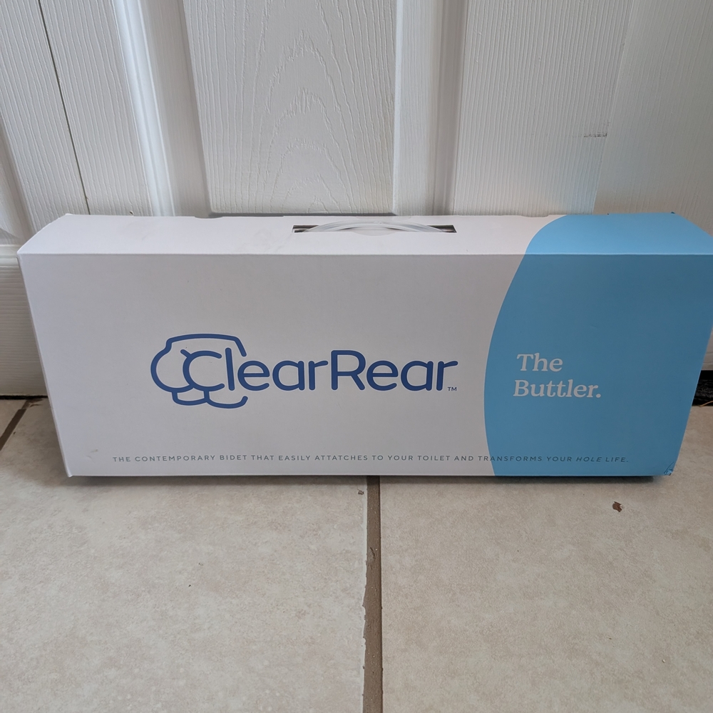 BRAND NEW NEVER OPENED Clear Rear The Buttler Bidet Attachment